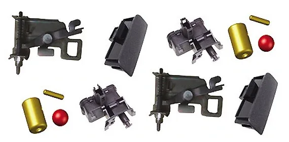 Sample child parts assembled by the robotic cell: latch bodies, springs and rivets