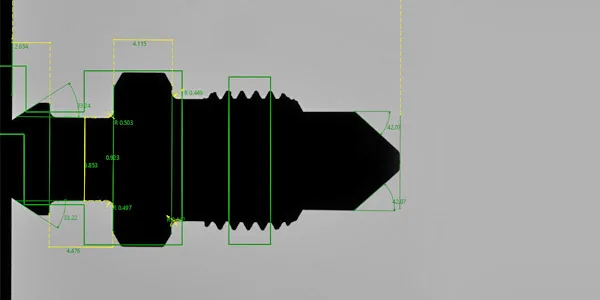 Horizontal Visigauge camera view: part silhouette with the measurement overlays — a threaded turned part